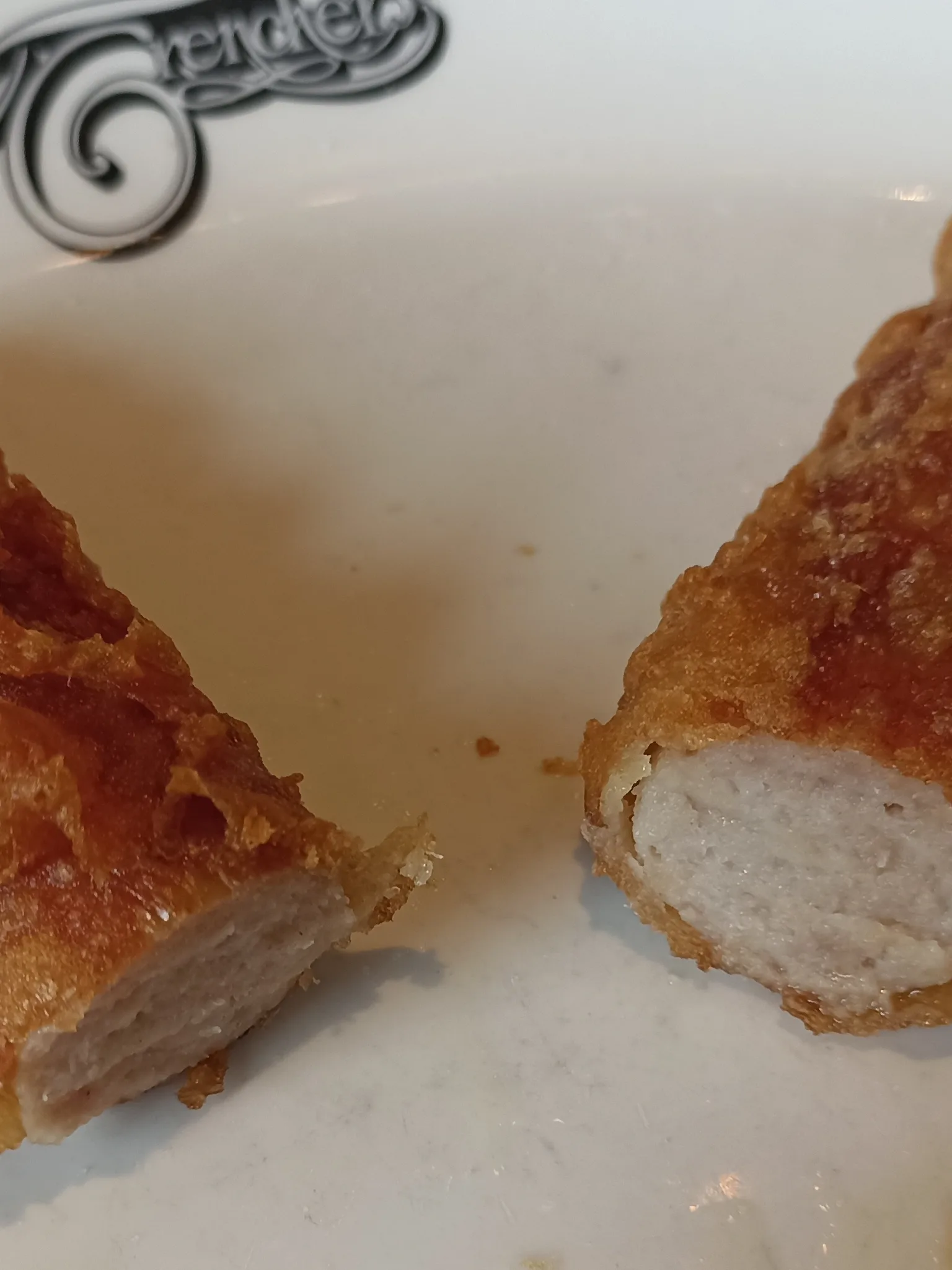 battered sausage: A cross section of a battered sausage from Trenchers, Whitby