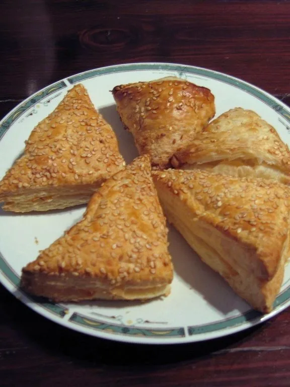 bourekas: A Photograph of three small Cheese Bourekases and Two "Turkish" Potato-filled Bourekases from Israel
