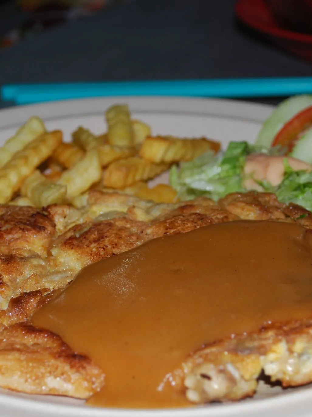 chicken chop: Chicken Chops and Chips at Red Tea House Original caption: Piter wanted chicken chops! mmm... gravy + chips! 红茶古 Red Tea House Kuantan, Malaysia