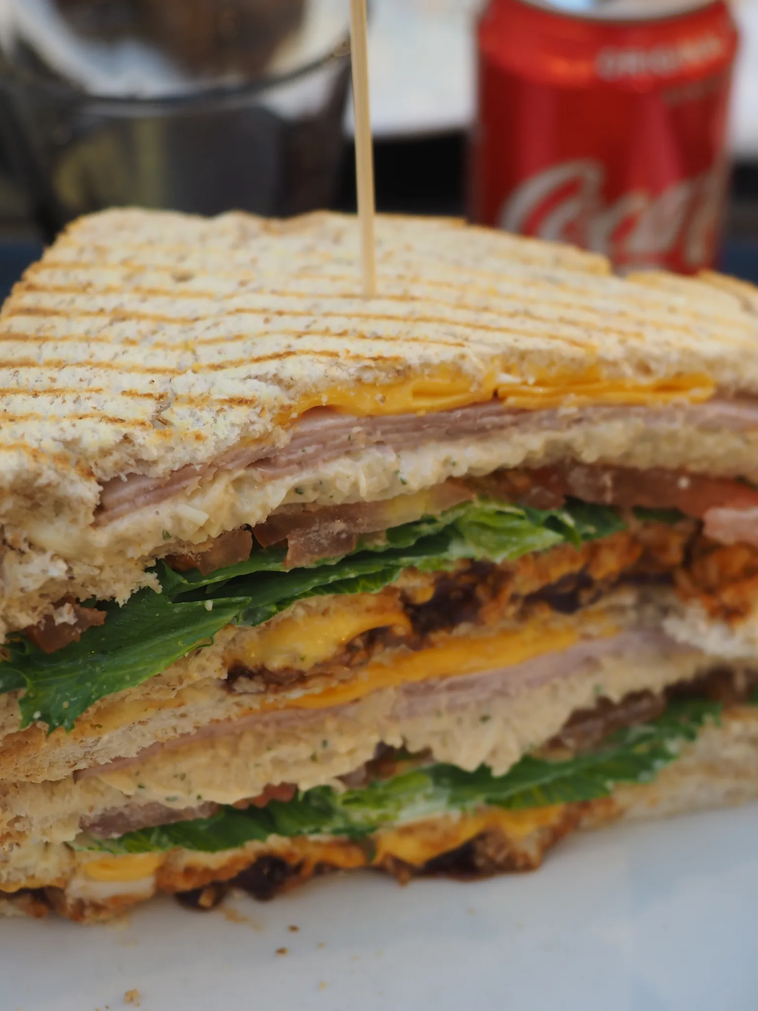 club sandwich: A club sandwich containing chicken and ham between four layers of bread, served at Café Picnic at the Forum shopping centre in Kamppi, Helsinki, Finland