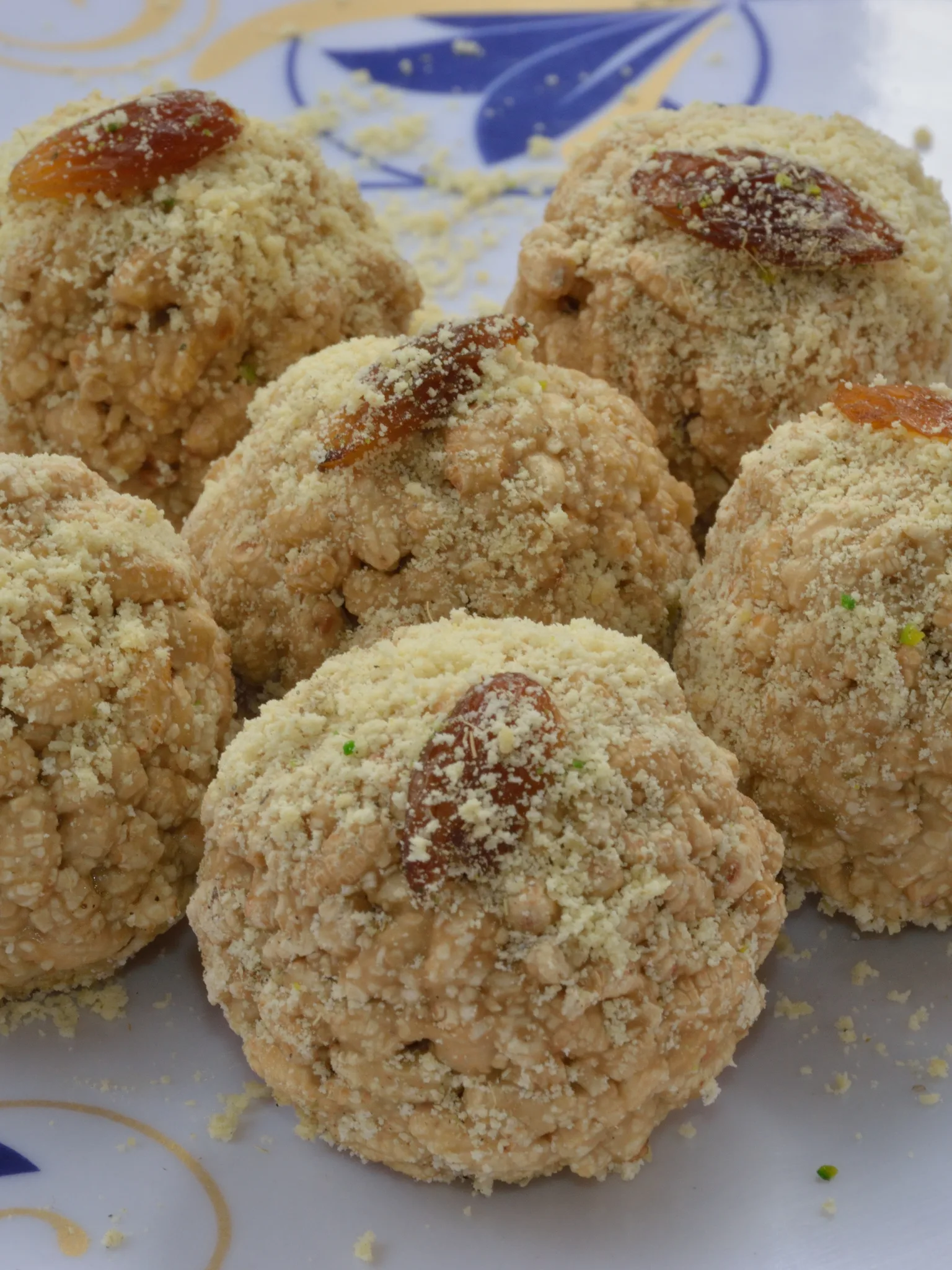 Jaynagarer Moa: The Joynagar Moa or Joynagarer Moya (জয়নগরের মোয়া) is seasonal sweet from Bengal. Photographed in Kolkata