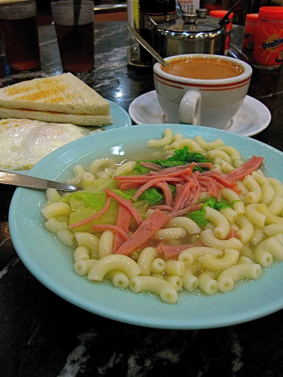 macaroni soup: Soup Macaroni in Hong Kong with egg, toast and tea as breakfast