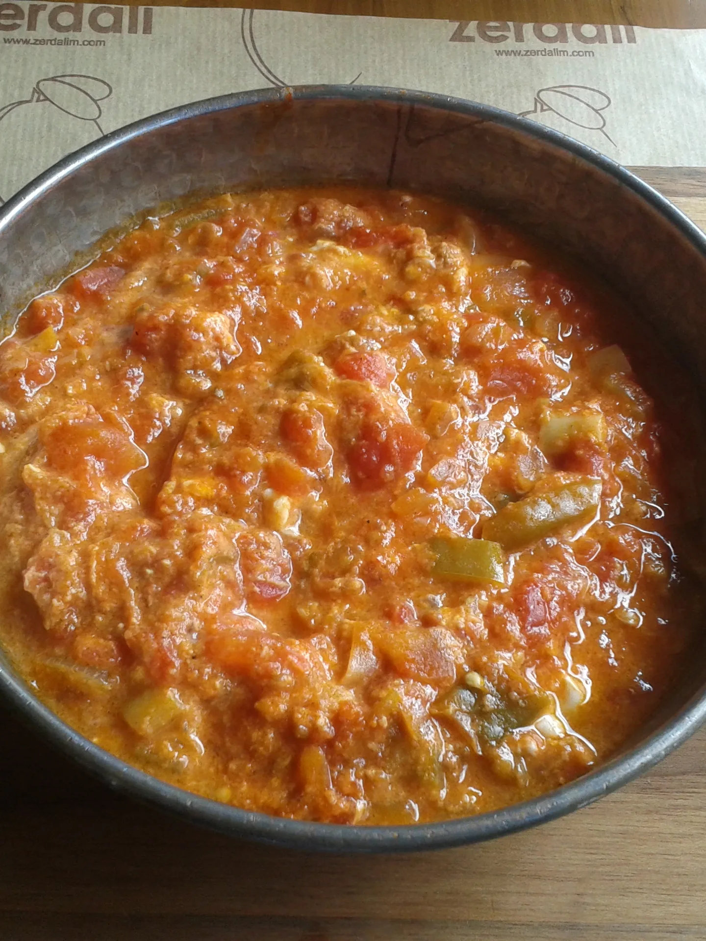 menemen: "Menemen" (Turkish dish whose basic ingredients are eggs and tomatoes) in a "sahan" (copper cooking pan with two handles)