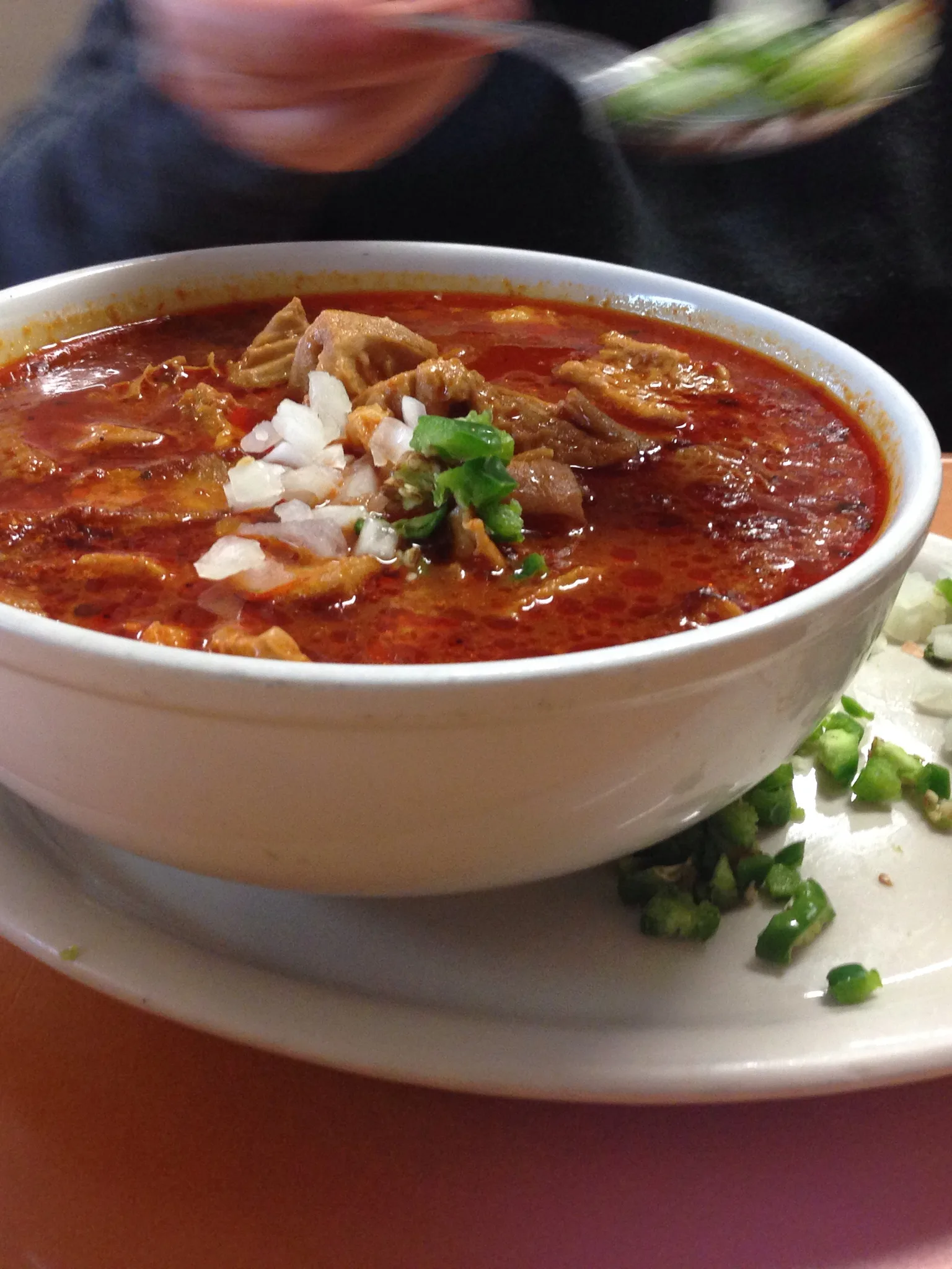 Menudo: Menudo, or pancita is a traditional Mexican soup, made with beef stomach (tripe) in broth with a red chili pepper base