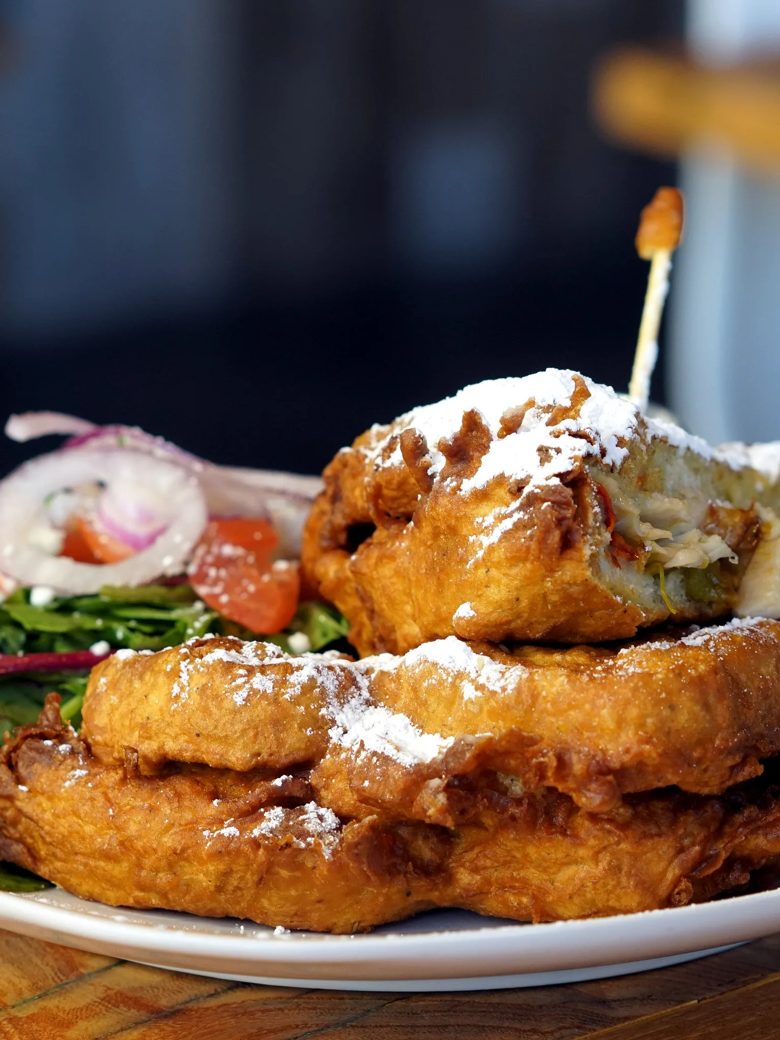 Monte Cristo sandwich: Green chile, turkey, pepper jack, sourdough, deep fried with powdered sugar and raspberry jam