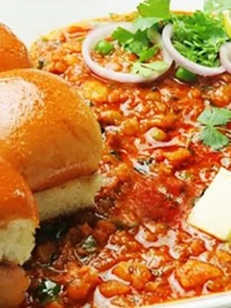 Pav bhaji: Fresh veggies boiled and mix with delicious masalas garnished with fresh butter