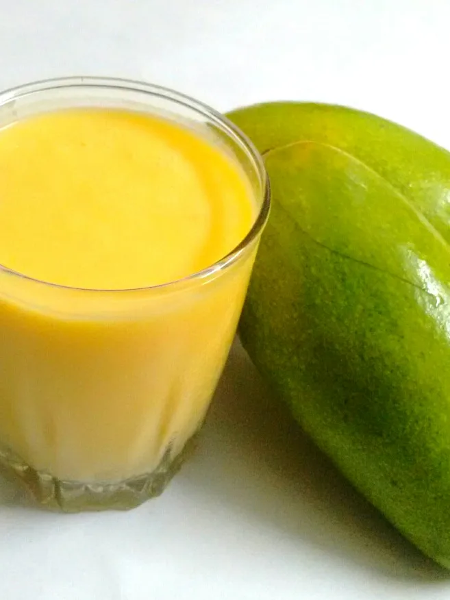 Poi: this is an image of mango shake which is made using mango and milk. sugar and curd are also added. it is loved by all indians