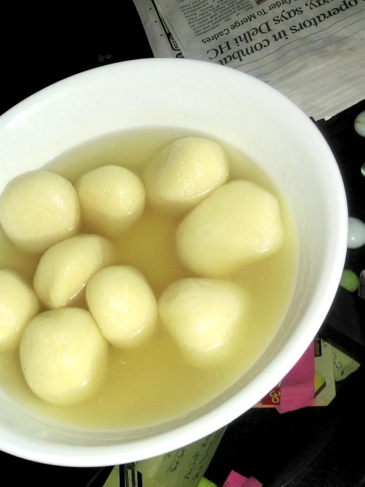 rosogolla: 'Rasgulla'. This is a famous sweet-dish, of Bengal origin but is enjoyed in the whole country. It is made up of cottage cheese and soaked in sugar syrup