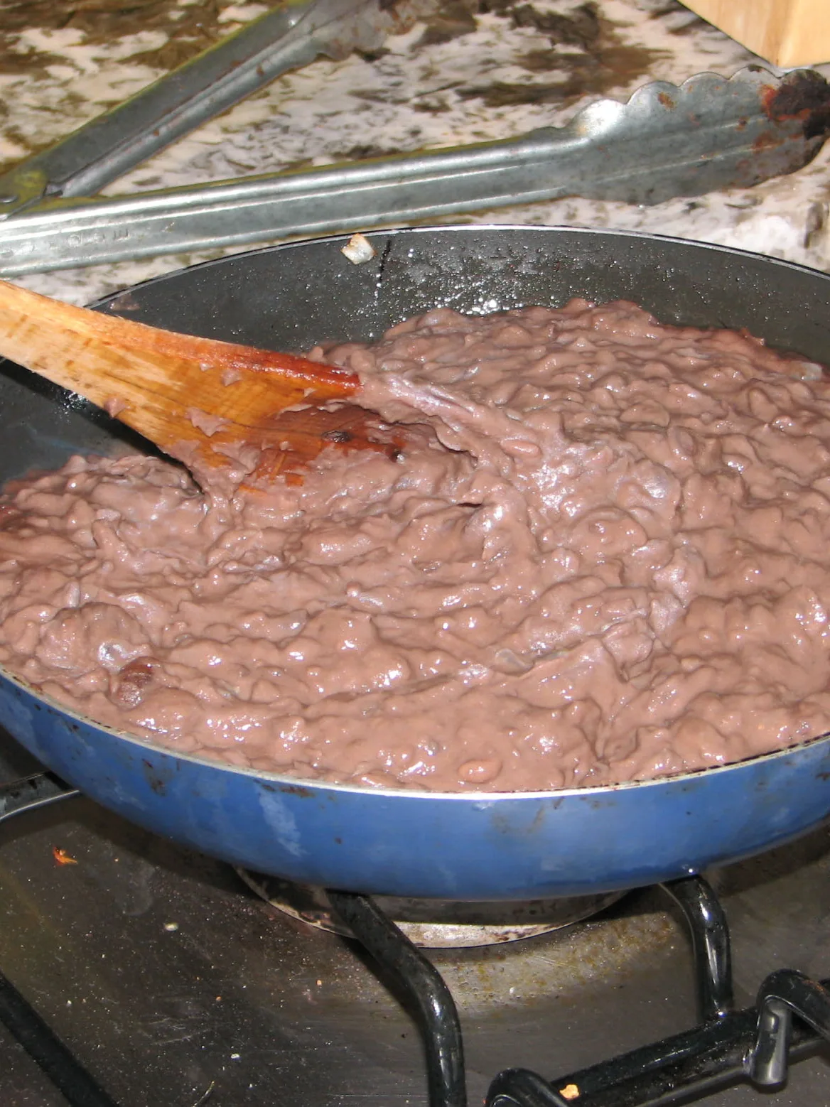 refried beans, a photograph of the dish