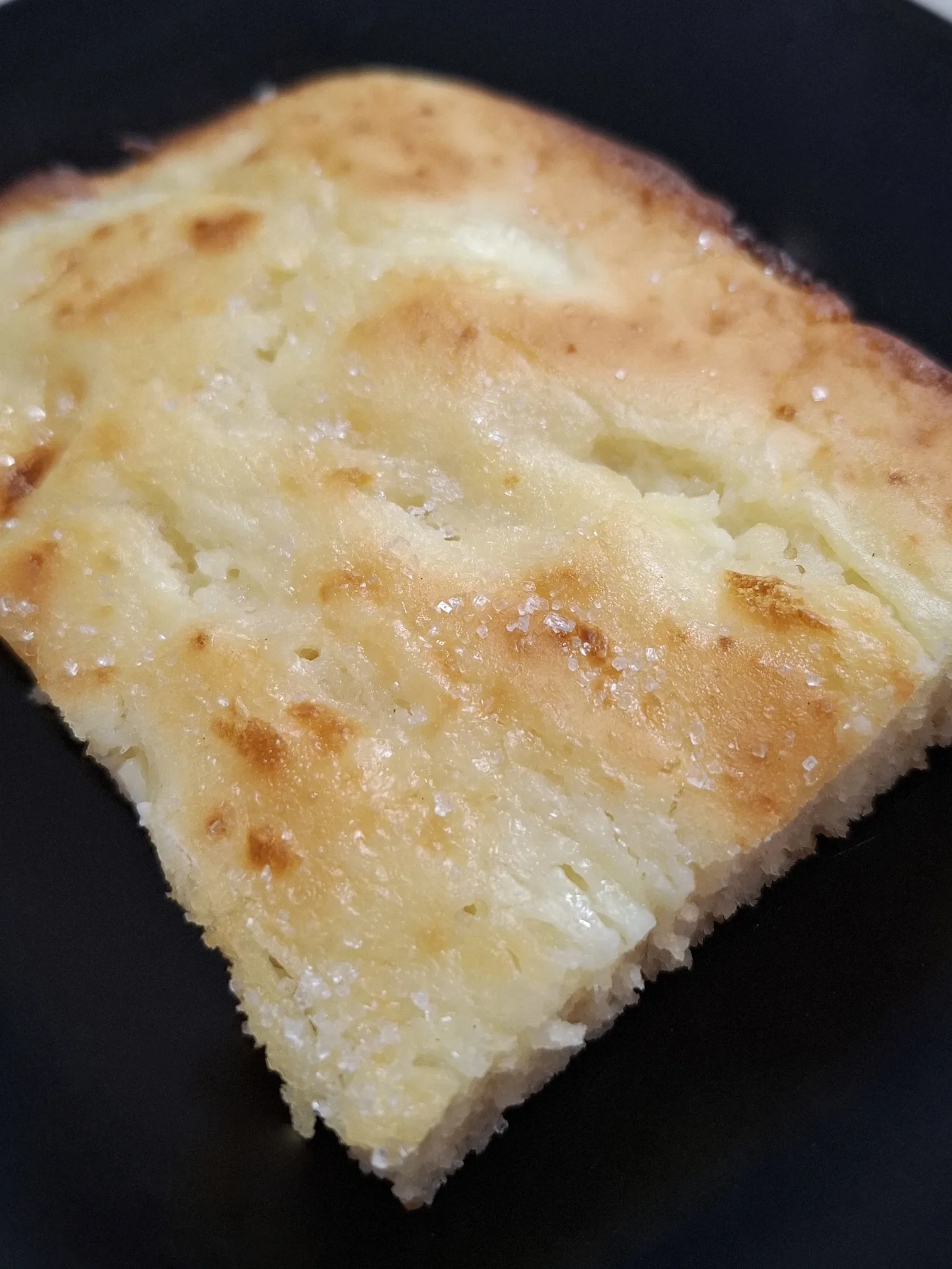 Zlijevka: Picture of zlijevka (also known as zlevanka, bazlamača, etc.), a traditional Croatian dessert dish made of corn flour and other ingredients